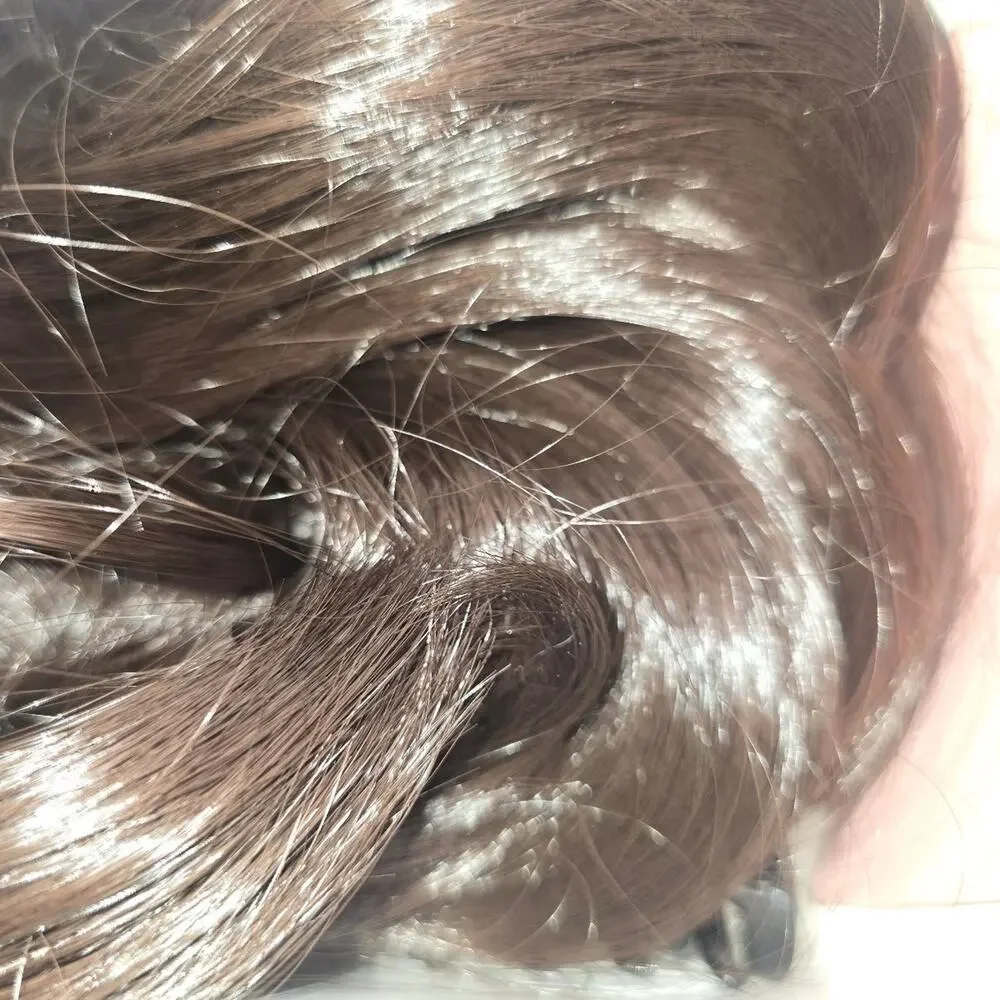 Short brown clip in extensions with wires hidden to add body to your bun!